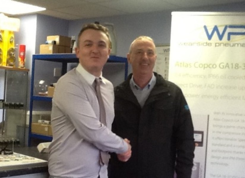 Dean Horn of Wearside Pneumatics and Paul Clark of Atlas Copco celebrate the company's appointment as a Premier Distributor